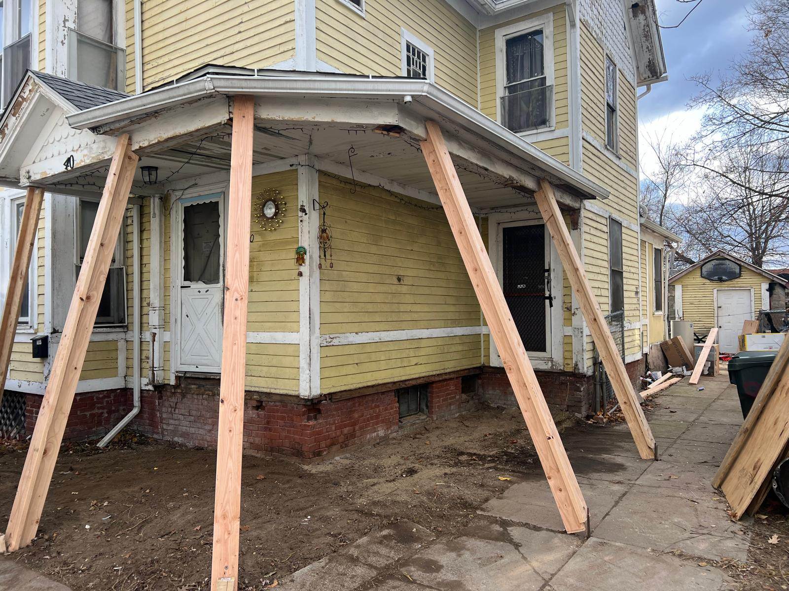 Wooden deck repair in progress after structural damage